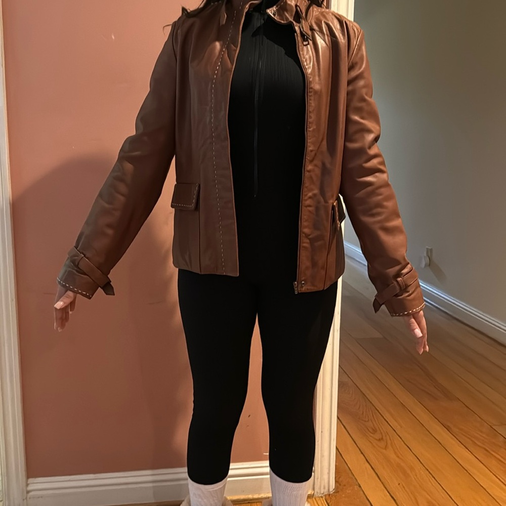 Selling this brown leather jacket, size 4 in womens. Brand is Margaret Godfrey.